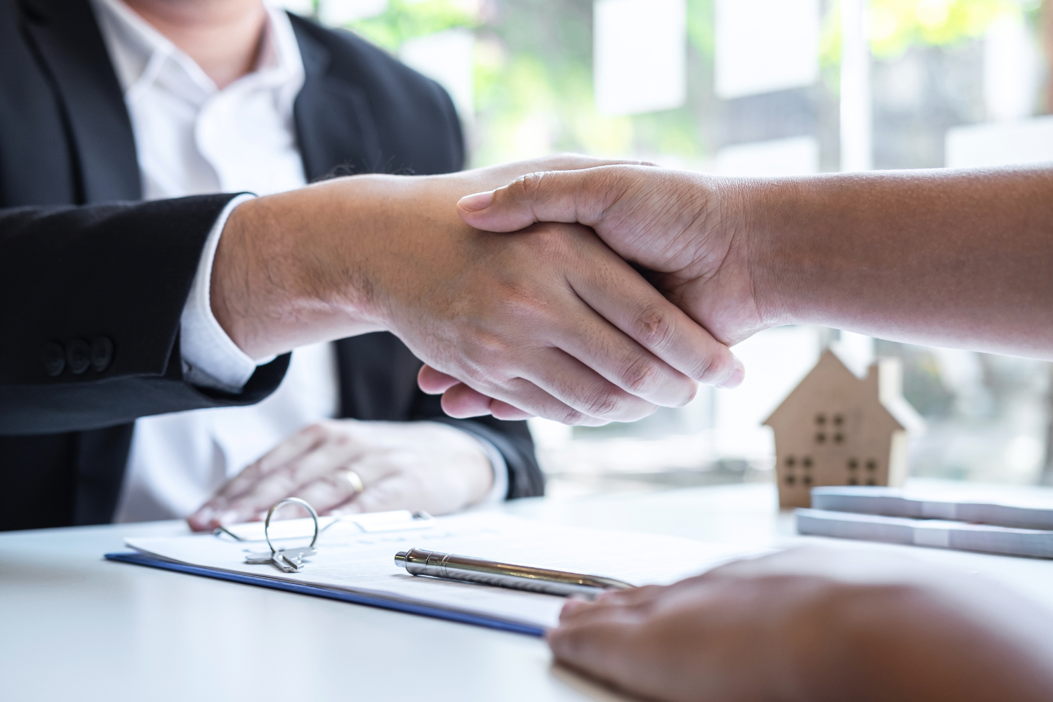 Realtor and Client Handshake